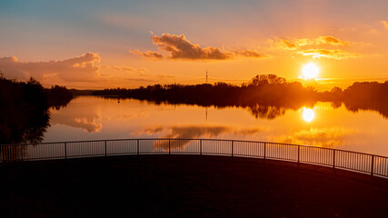 Beautiful sunset with reflections near Plattling, Isar, Bavaria, Germany