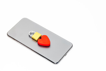 smartphone with a lock and a love heart. Concept of secret love affair, private life