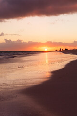Obraz premium Orange sunrise over Atlantic Ocean. Bavaro beach