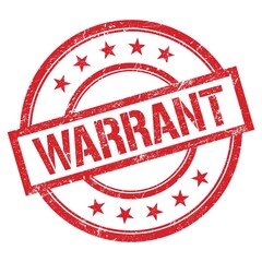 WARRANT text written on red vintage stamp.