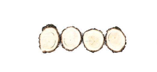 Wooden cuts. Cross section of a wooden block. Growth rings. Slabs. On a white background