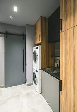 Modern Interior Of Laundry Room In Luxury Private House.