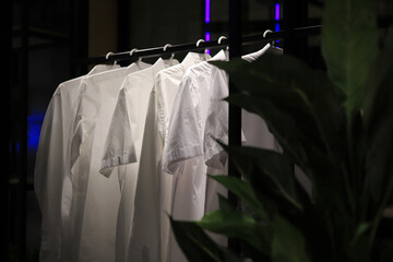 Luxurious white shirts in the closet