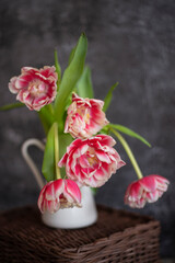 Spring still life. A bouquet of scarlet tulips.