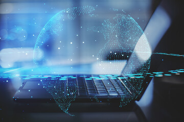 Big data network technologies with digital round world map with satellite at opened laptop background