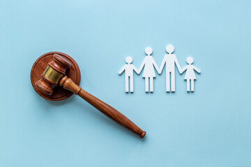 Family figure with judge gavel. Family law concept