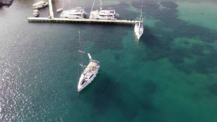 Sail Boat Ready To Docking At Sea Marina 4K Video 
