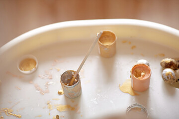 Happy Easter concept. Preparation for holiday. Paints and quail eggs with copy space