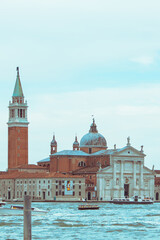 Fototapeta premium view of Church of San Giorgio Maggiore boats before it famous landmark place