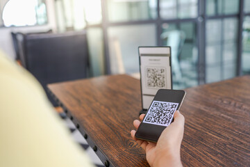 Qr code payment. E wallet. Man scanning tag accepted generate digital pay without money.scanning QR code online shopping cashless payment and verification.technology concept
