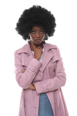 Fashionable woman in a pink coat.