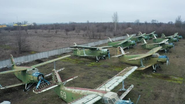 Aeiral view of a formation of An-2 and An-24RT abandoned airplanes