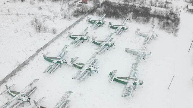 Aeiral view of a formation of An-2 and An-24RT abandoned airplanes