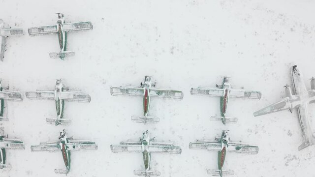 Aeiral view of a formation of An-2 and An-24RT abandoned airplanes