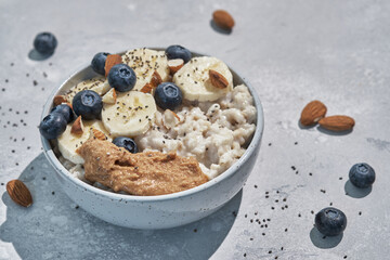 Breakfast: oatmeal with bananas, blueberries, chia seeds and almond butter