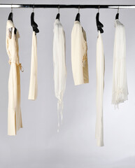 Elegant and trendy women's clothes hanging