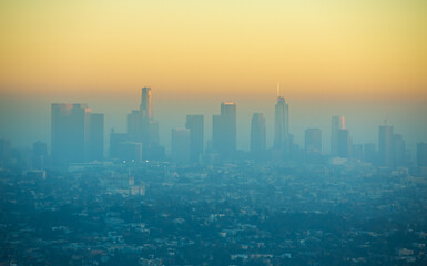View of Downtown Los Angeles, California skyscrapers during colorful sunset