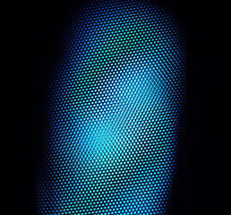 Close up macro wire mesh texture on audio microphone pop shield