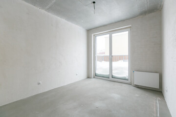 interior of the apartment without decoration in gray colors. rough finish
