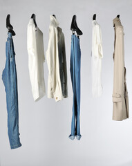 Elegant and trendy men's clothes hanging