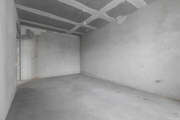 interior of the apartment without decoration in gray colors. rough finish