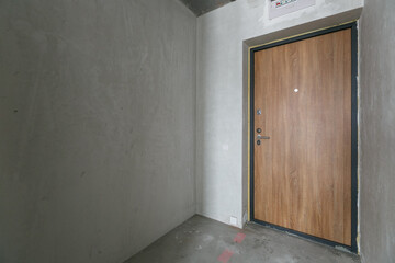 interior of the apartment without decoration in gray colors. rough finish