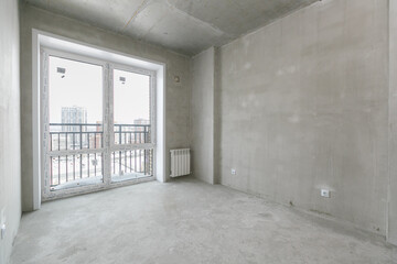 interior of the apartment without decoration in gray colors. rough finish
