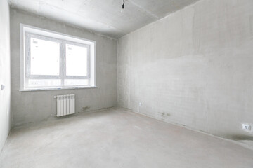 interior of the apartment without decoration in gray colors. rough finish