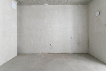 interior of the apartment without decoration in gray colors. rough finish