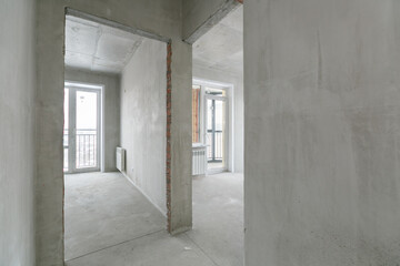 interior of the apartment without decoration in gray colors. rough finish