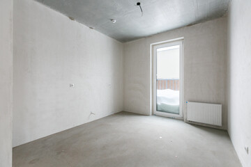 interior of the apartment without decoration in gray colors. rough finish
