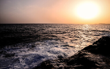 Strong Waves Crashing on the Volcanic Coast