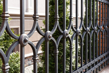 Forged metal fence in retro style