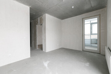interior of the apartment without decoration in gray colors. rough finish