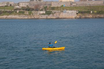 Canoeing in Plymouth sound,