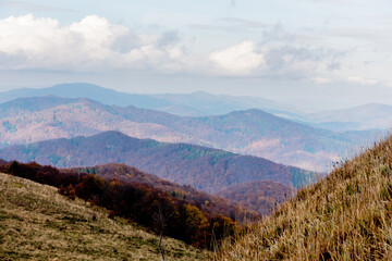 Autumn in the Bieszczady Mountains Poland. Trekking trail, blue sky.