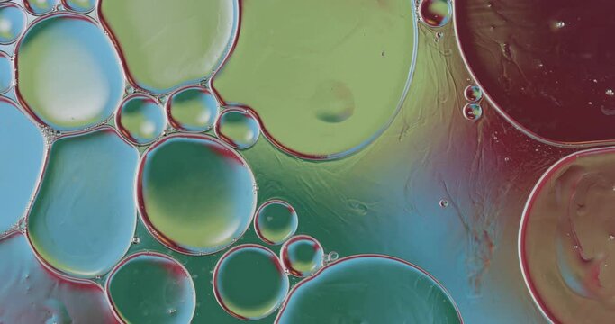 Movement oxygen bubbles in a liquid. Beautiful structure of water in macro a natural background	