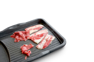 People grilling korean barbeque