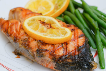 Grilled salmon steak with green beans