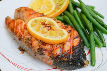Grilled salmon steak with green beans