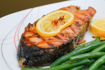 Grilled salmon steak with green beans