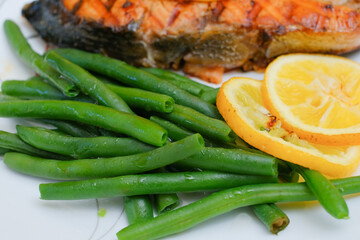 Grilled salmon steak with green beans