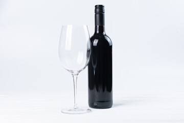 Bottle of red wine and Italian or French wine glasses