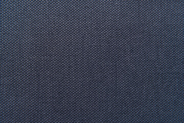 Fototapeta na wymiar background of dark blue, textured surface, with sackcloth imitation, top view