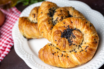 Traditional delicious Turkish phyllo stuffed with spinach, cheese (Turkish name; Gul borek or gul boregi) Rose shaped pastry.