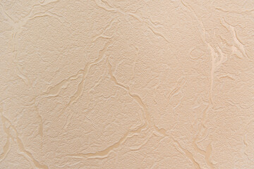 pastel pink, textured wallpaper, with embossed abstract pattern, top view