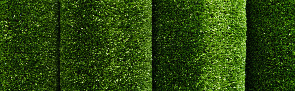 top view of green, artificial carpet background, banner
