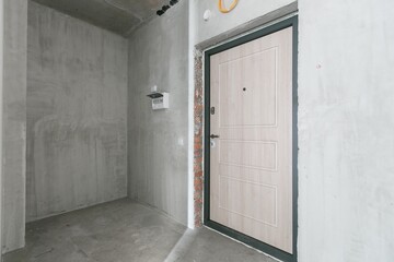 interior of the apartment without decoration in gray colors. rough finish