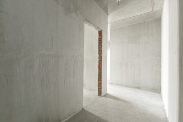 interior of the apartment without decoration in gray colors. rough finish