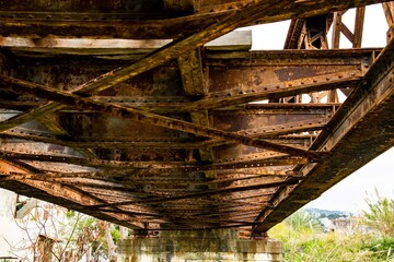 Obraz premium steel construction of an old out of service railroad bridge near Byblos in Lebanon